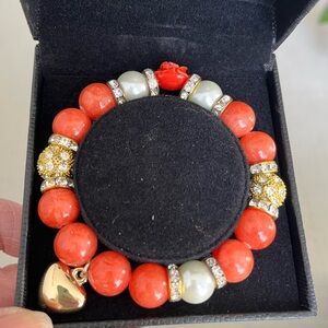 Burnet orange stone bracelet with gold accents